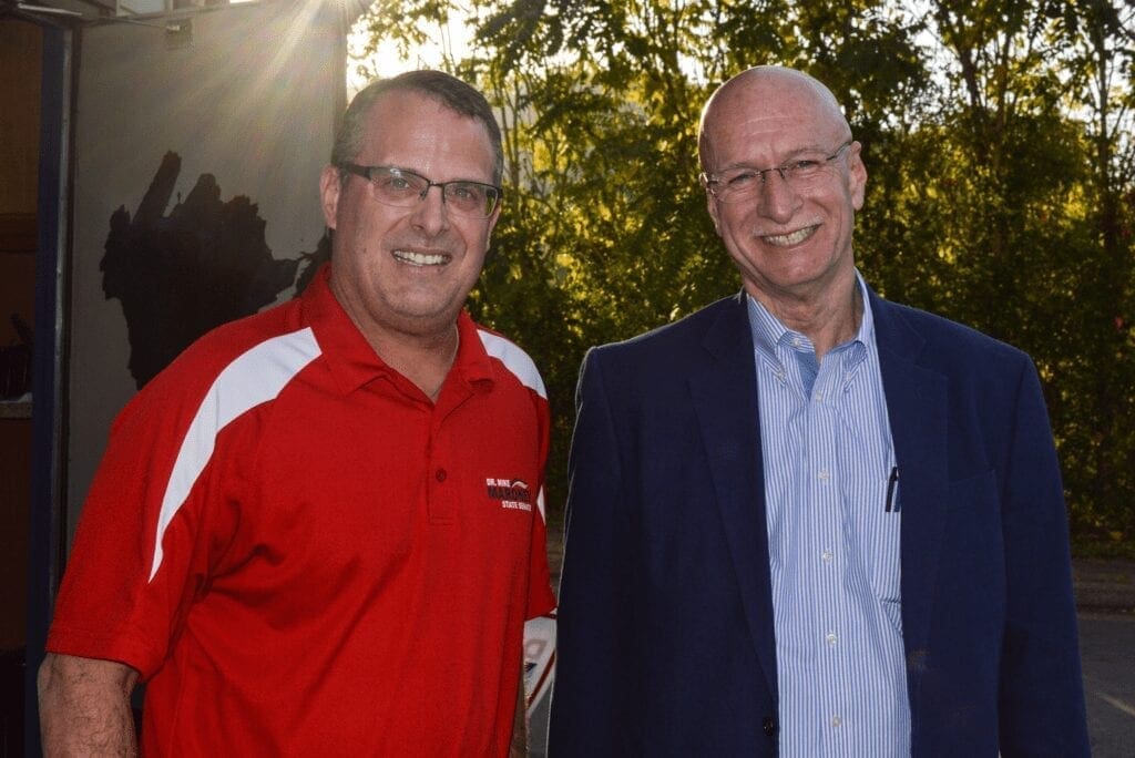 Two men posing for a photo.