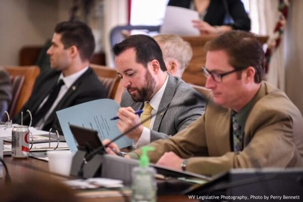 A man checking over paperwork.