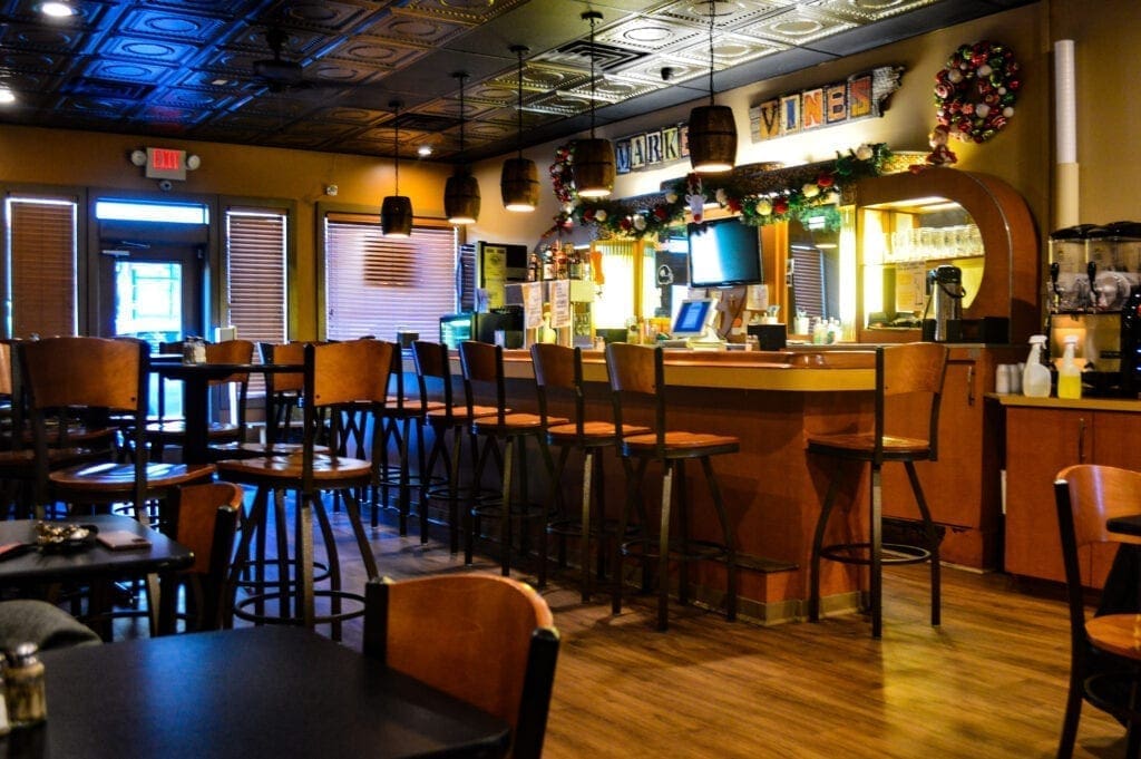 Seating and a bar in a restaurant.