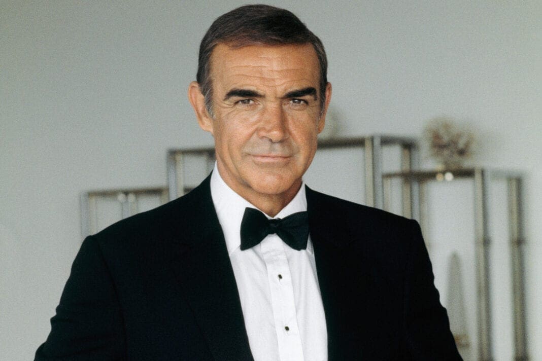 A man in a tuxedo.