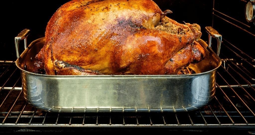 A turkey roasting in the oven.
