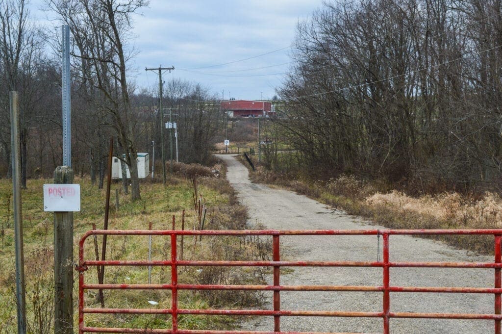 A gravel entrance to a venue.