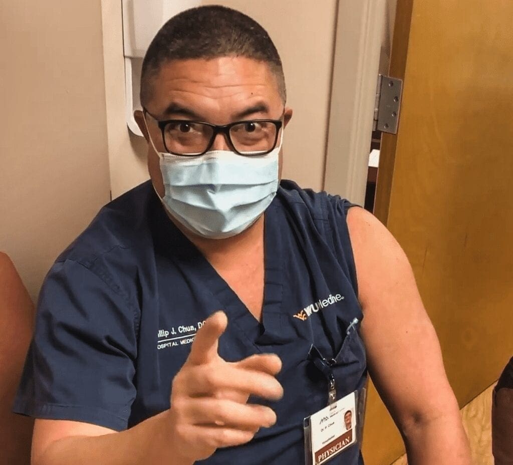 A man wearing a surgical mask.