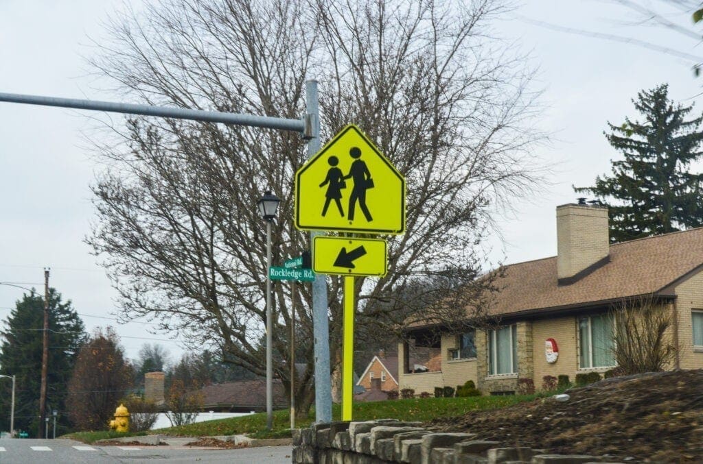 A crosswalk sign.