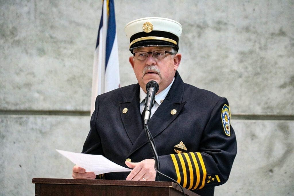 A fire chief making a speech.