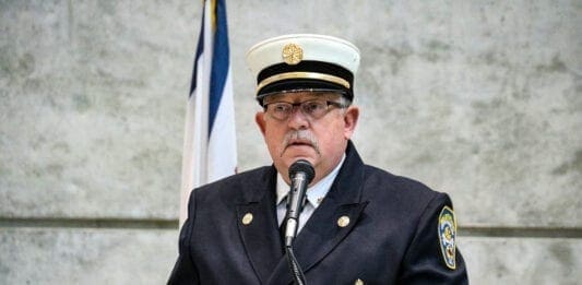 A fire chief making a speech.