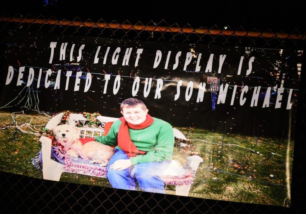 A banner of a child with his dog.