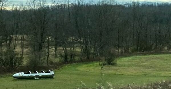 A photo of a vessel in a big yard.