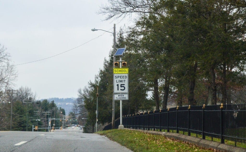 A photo of a school zone sign.