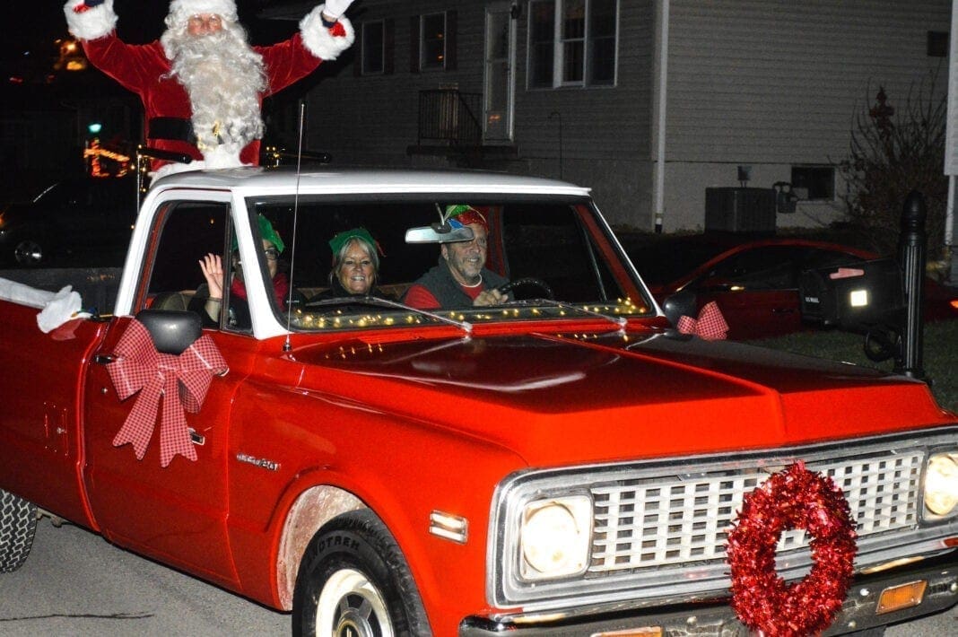 There are three people in the truck.