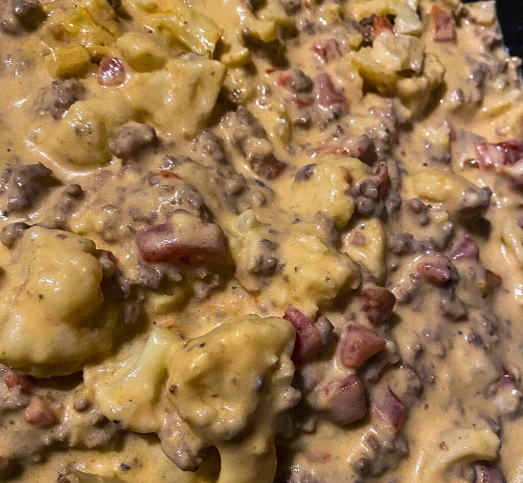 A close up of a cheeseburger soup.