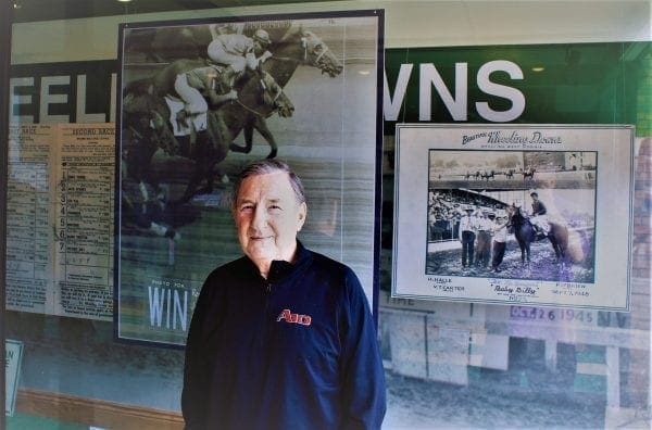 A man in front of a display.