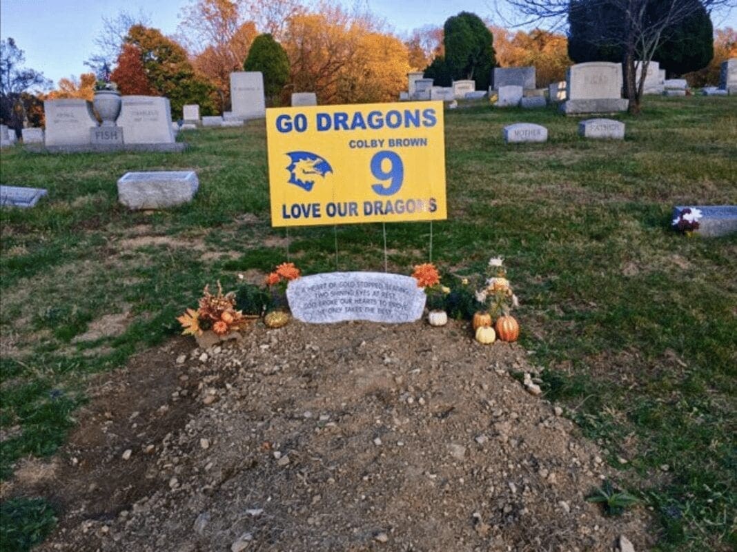 A newly established grave in a cemetery.