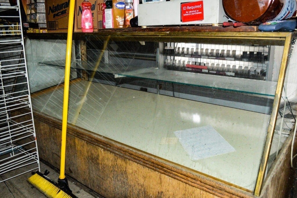 An old store counter that is empty.