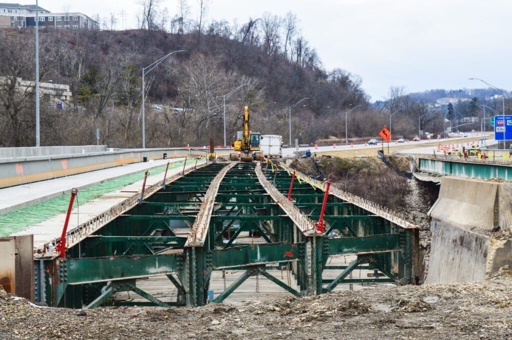 An interstate bridge down to its steel.