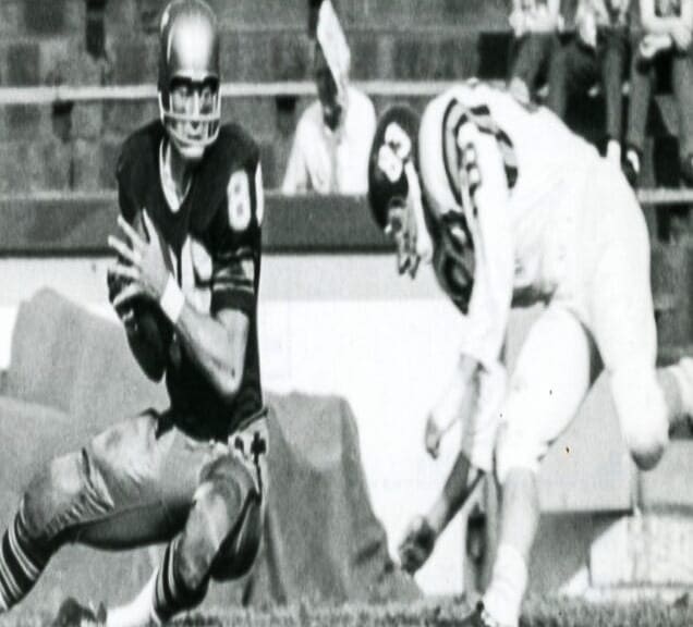 A phot of two football players.