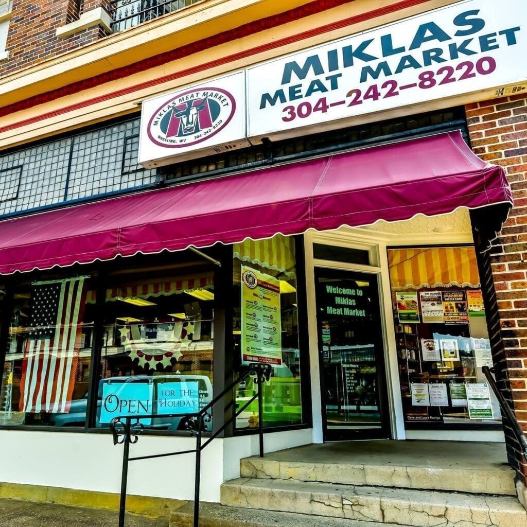 A photo of the front entrance a butcher shop.