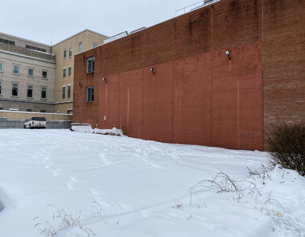 A snow-covered parking lot.