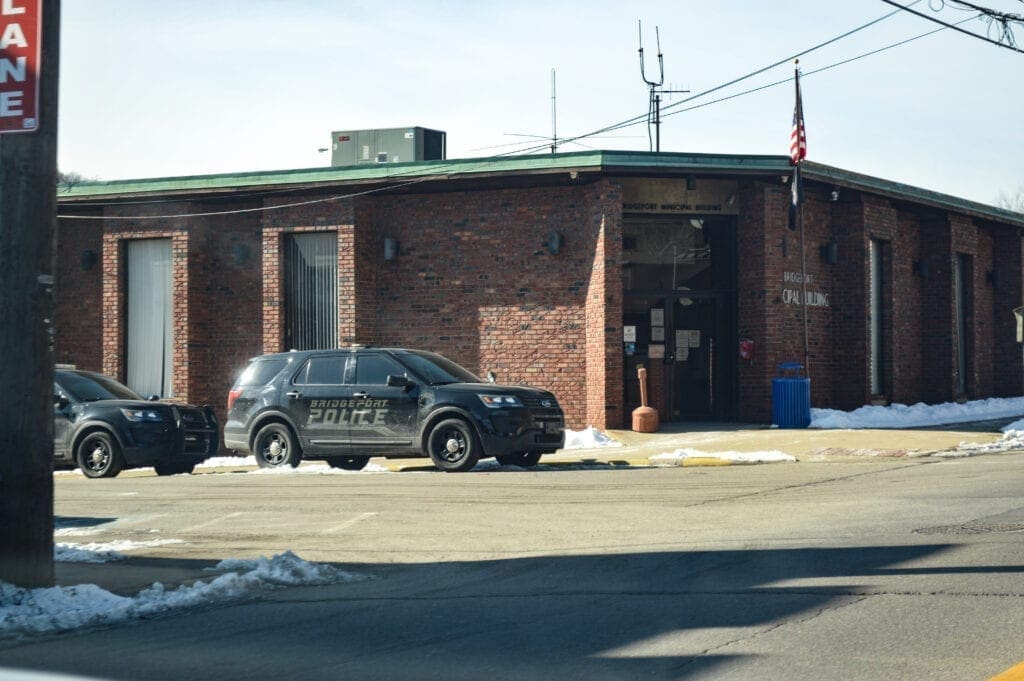 A Bridgeport Police Department SUV sits outside the department office in Bridgeport.
