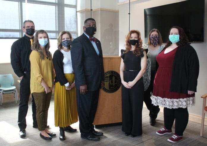 A group of men and women.