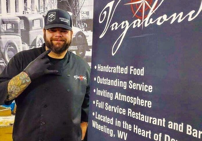 A man wearing a black ballcap.
