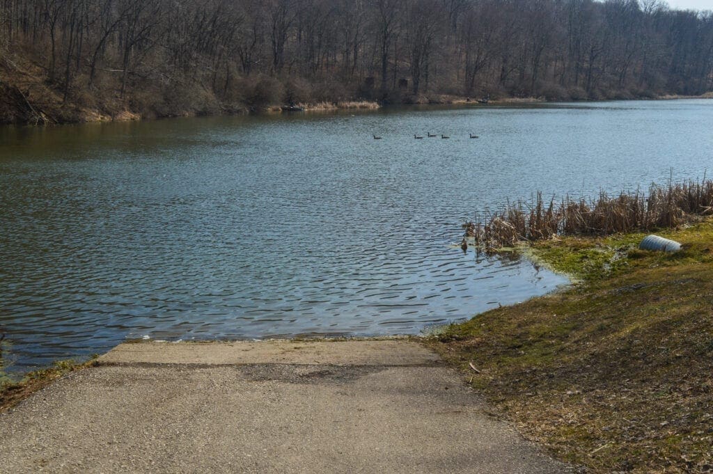 A boat ramp at a lake.