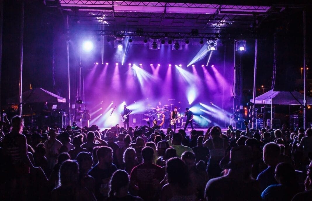 A large stage with purple lighting.