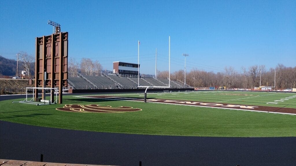 A turf football field.