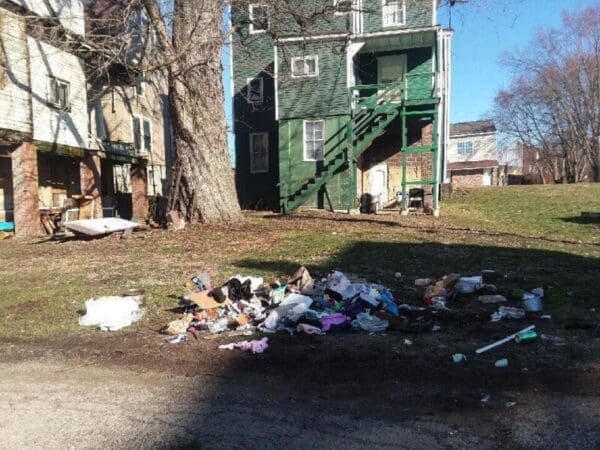 Trash along an alley.