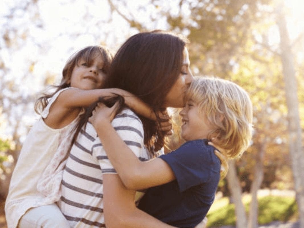 A mother with her kids.