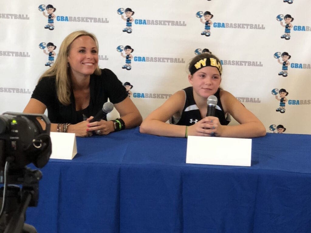 Mom and daughter at the podium