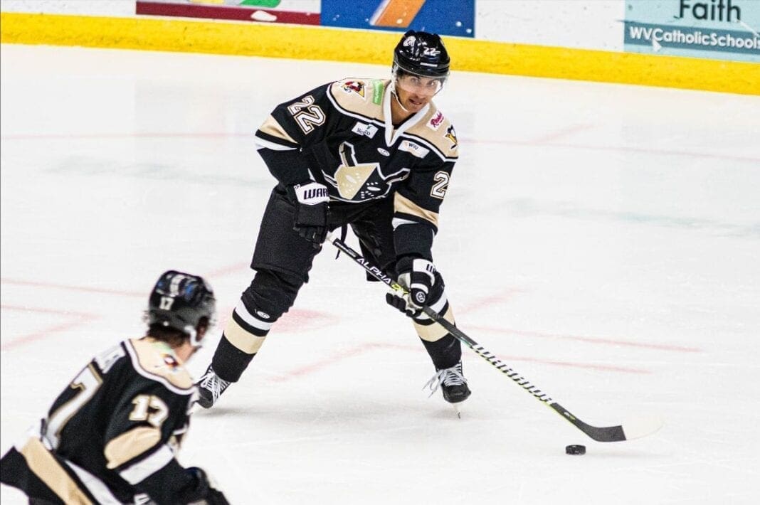 A hockey player on ice.