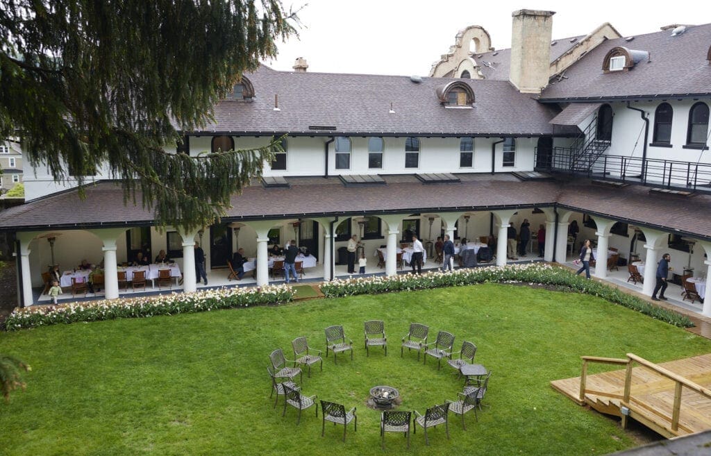 The grass is green in the courtyard.