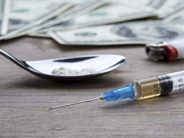 A syringe with heroin in it.