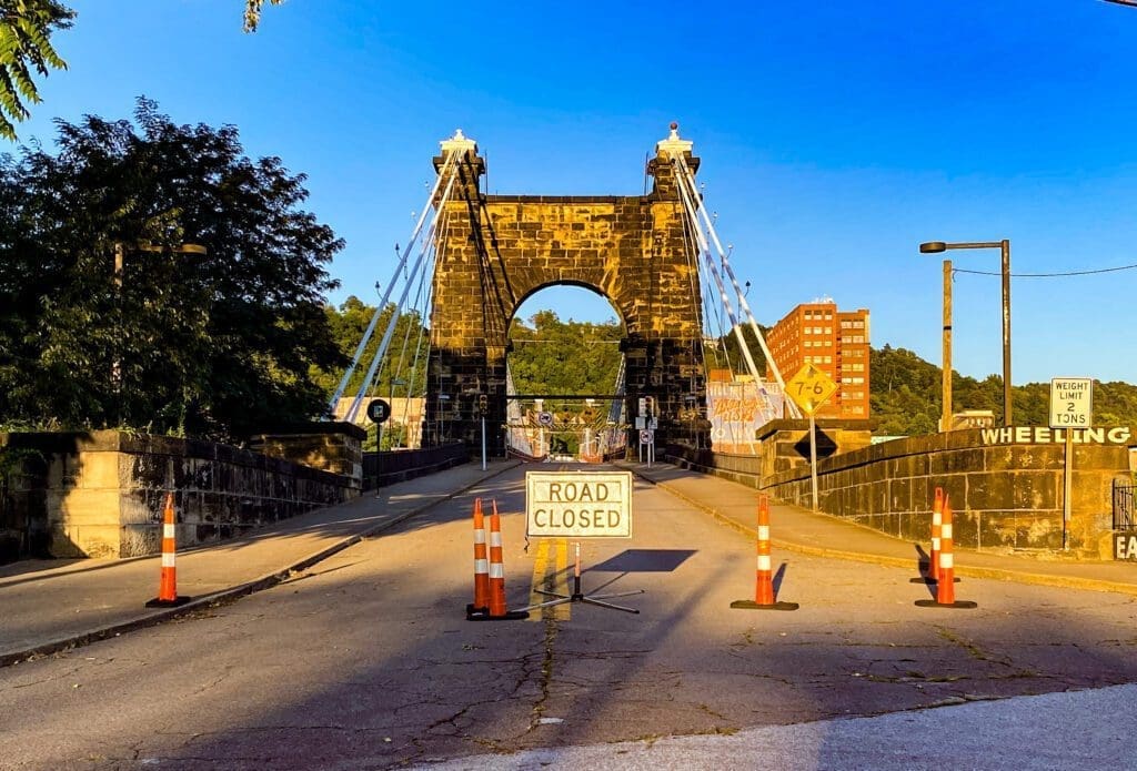 A photo of a bridge on a sunny day.