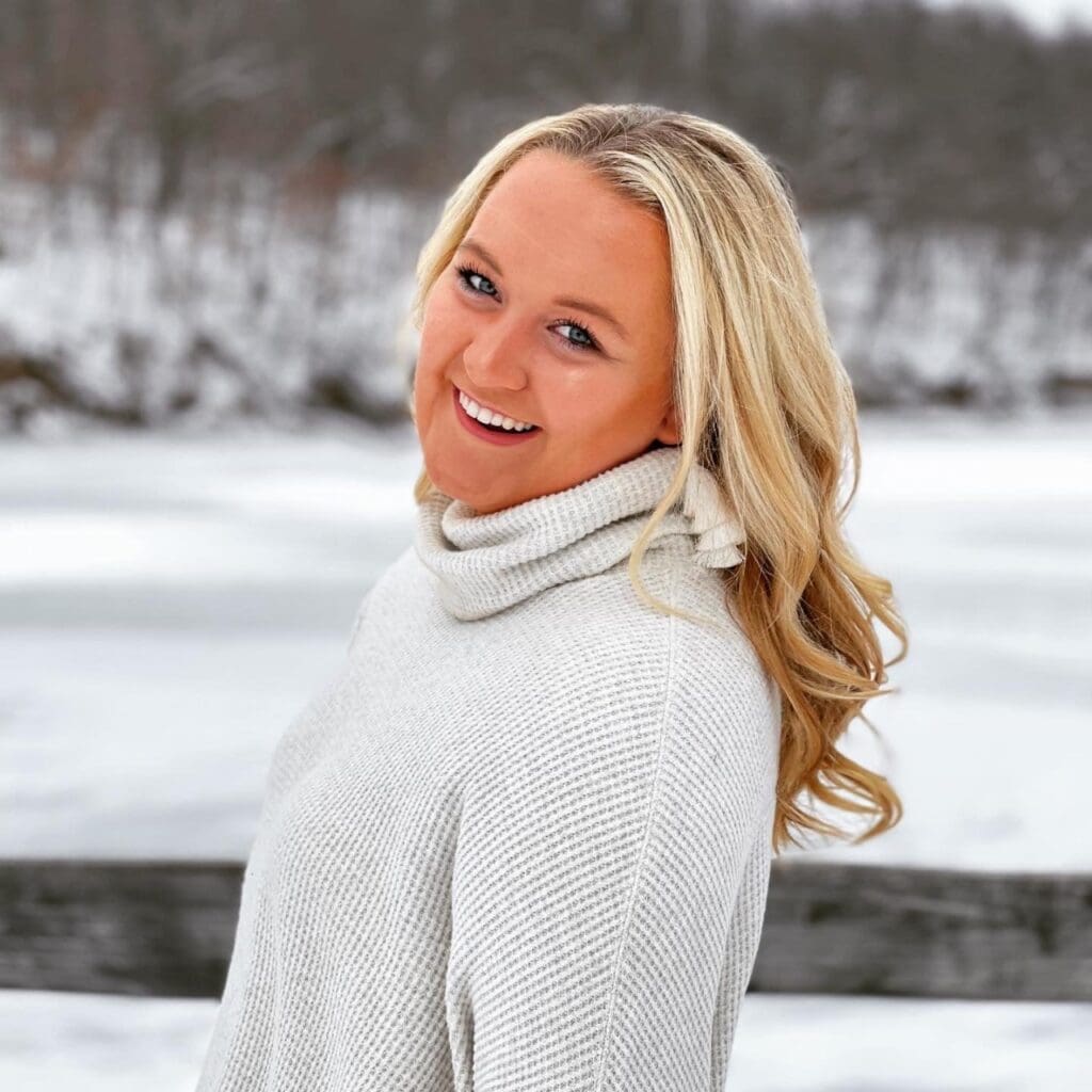 A lady posing for a photo.