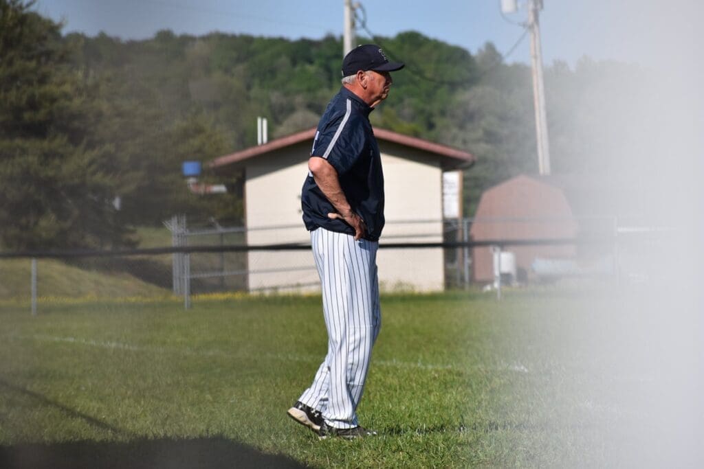 Photo of Coach Dave Cisar in the sectional tournament in 2019. Photo by Teran Malone