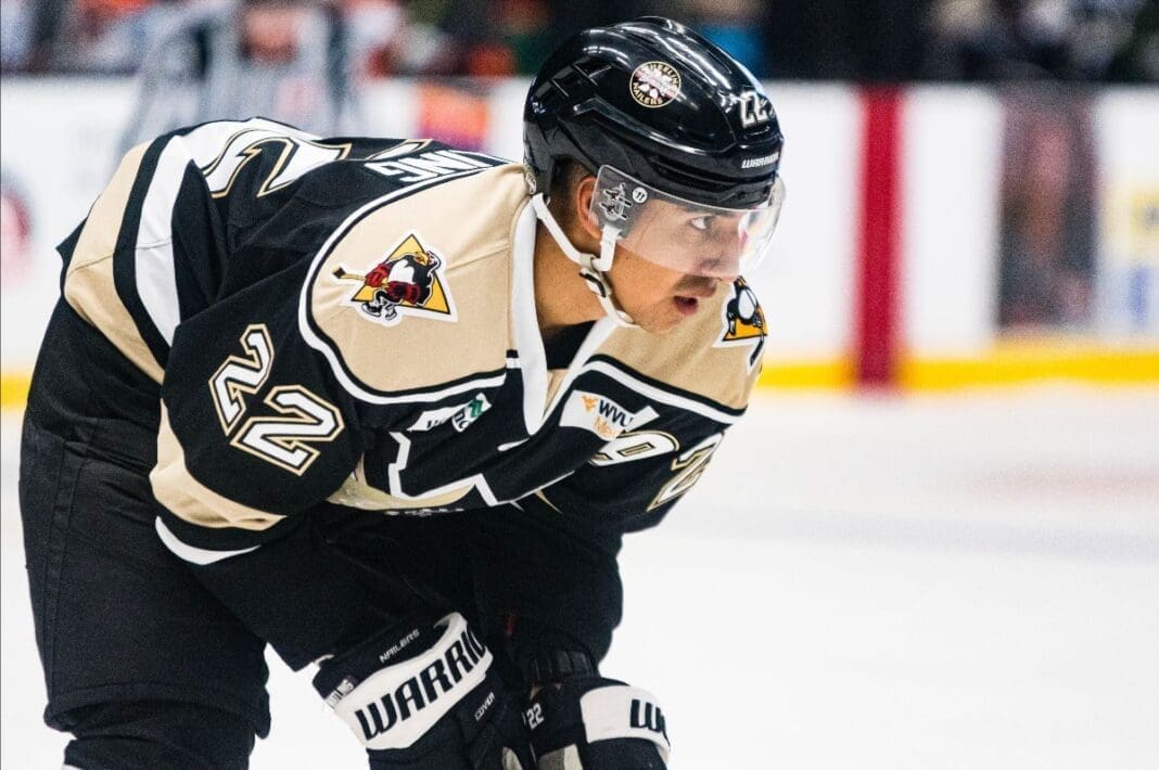 A hockey player on ice.