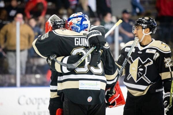 Hockey players on the ice.