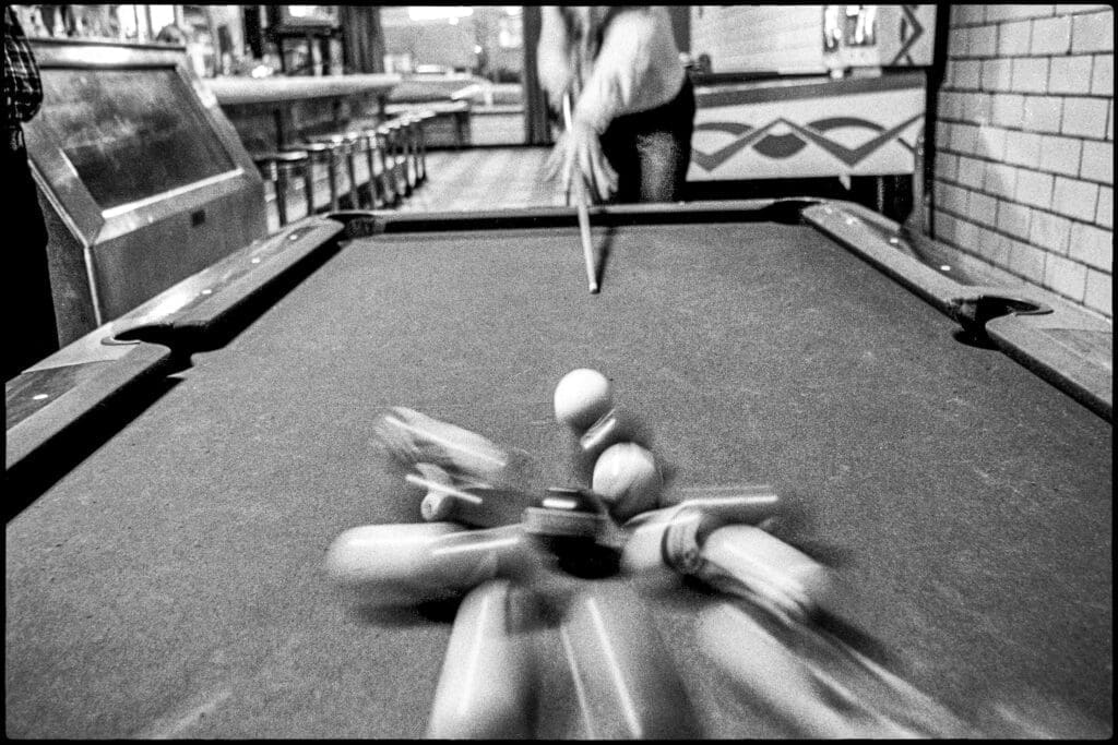 A pool table with balls.