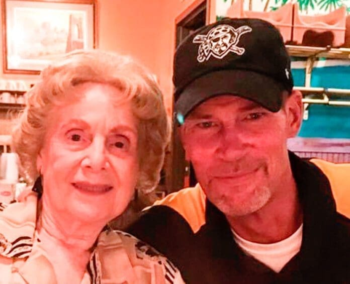 A photo of man and his mom.