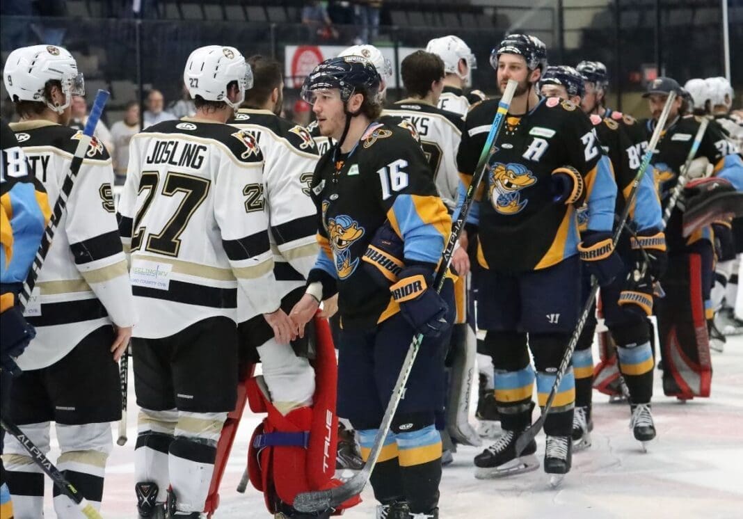 Two teams shaking hands.