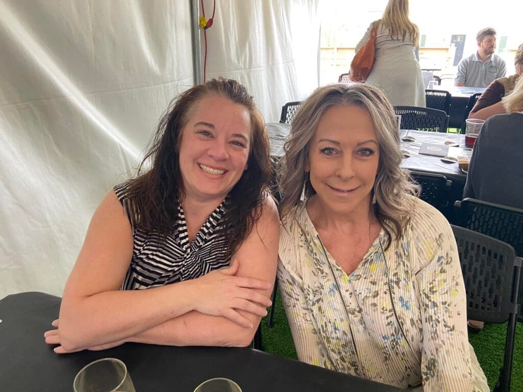 Two ladies at a table.