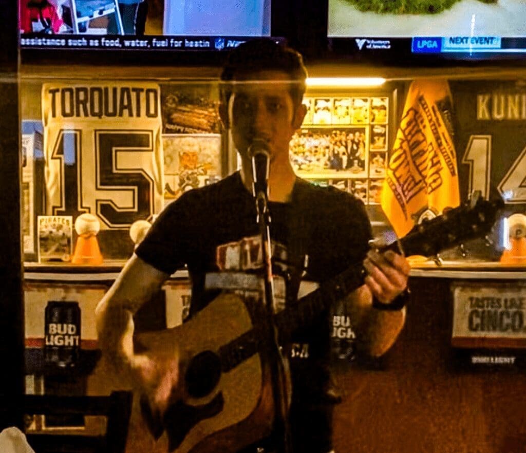 A man with a guitar.