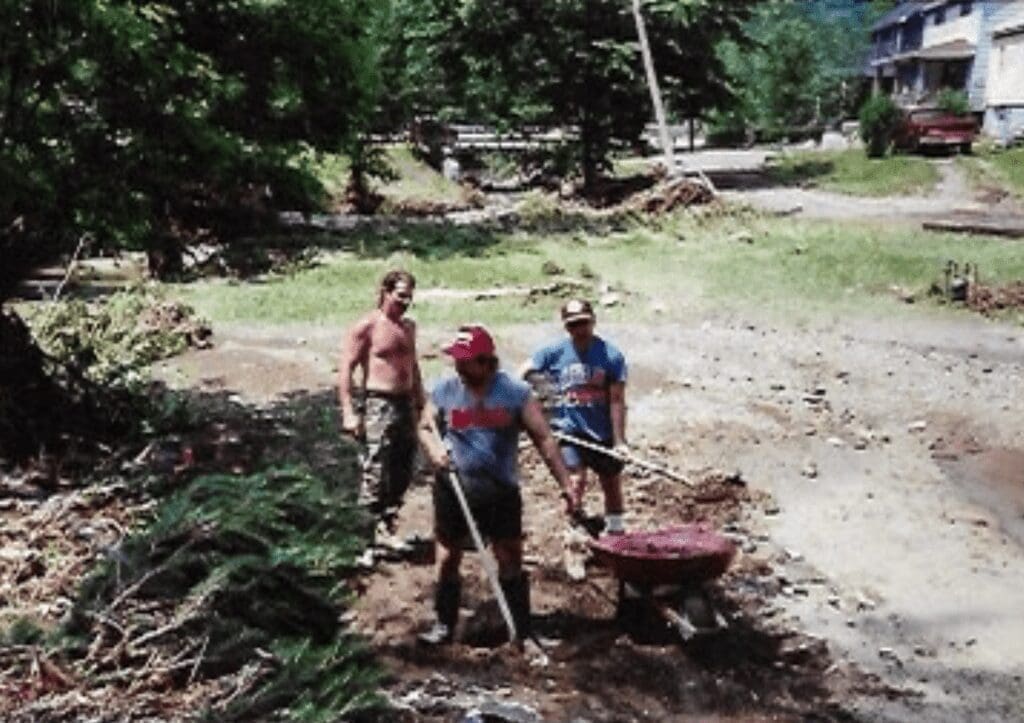 Three men with shovels.