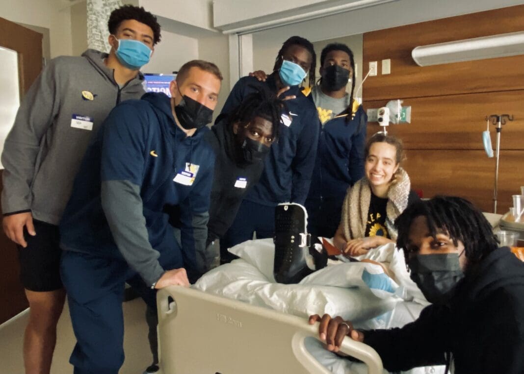 A group of people in a hospital.