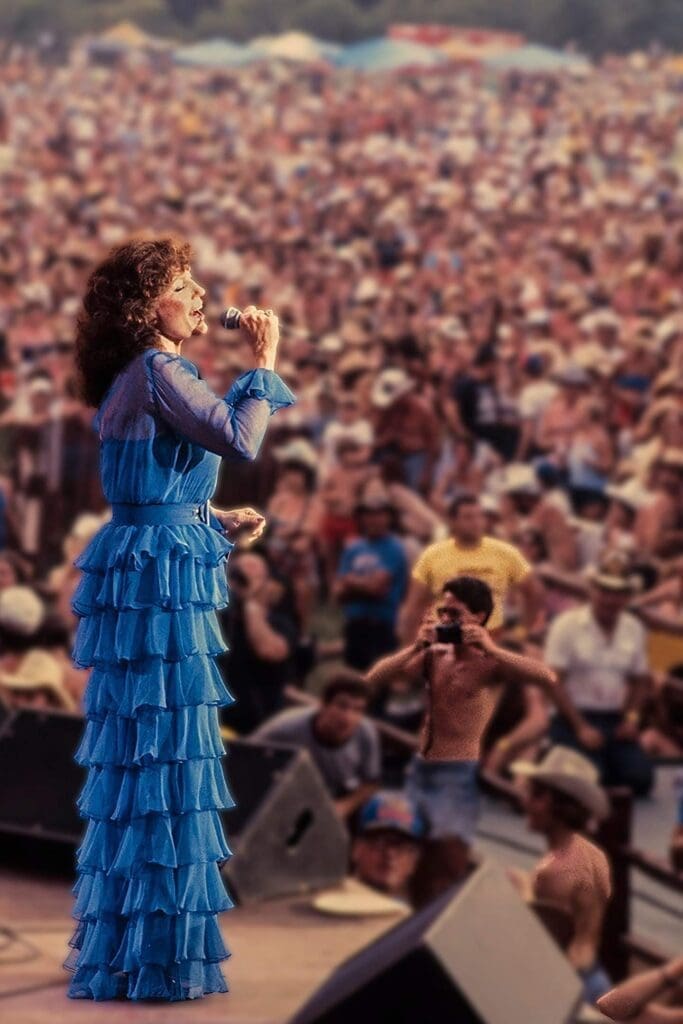 A woman in a blue dress.