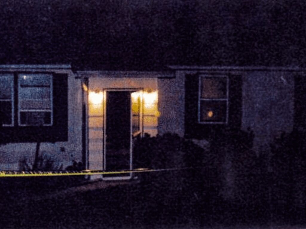 An image of an old photo of a house.