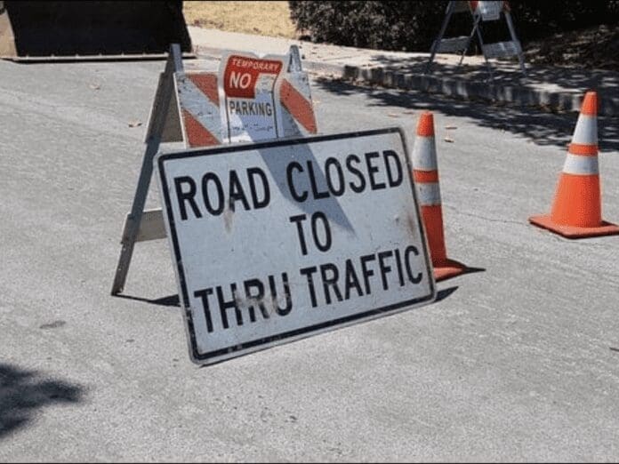 A road closed sign.