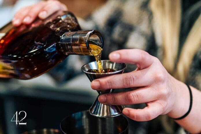 DAF_3663 A pour of liquor.